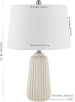 SAFAVIEH Lighting Collection Sawyer Modern Ivory Ceramic 24-inch Bedroom Living ... - Image 4